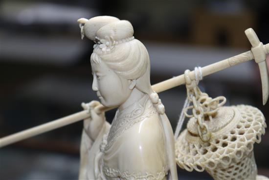 A Chinese ivory carving, late 19th century, He Xiang height 23cm